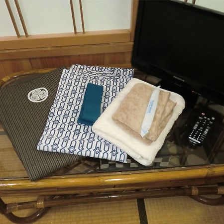 โอชุกุ ออนเซน มินชุกุ ซะกะเอะยะ Hotel Shizukuishi ภายนอก รูปภาพ